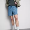 Shorts med strukturert snøring i livet