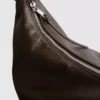 Skulderveske med ringdetaljer