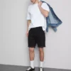 Slim-fit denimshorts med middels høy midje