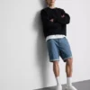 Slim-fit denimshorts med middels høy midje