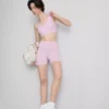 Sømløs aktiv crop-top med kryssrygg
