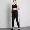 Sømløs aktiv crop-top med kryssrygg