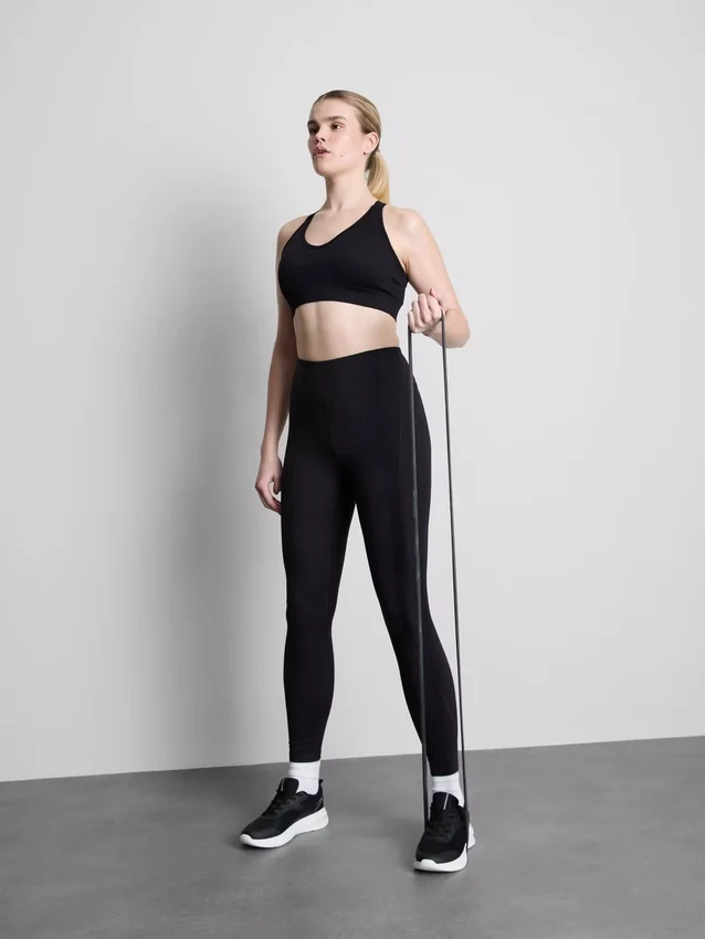 Sømløs aktiv crop-top med kryssrygg
