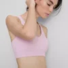 Sømløs aktiv crop-top med kryssrygg