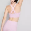 Sømløs aktiv crop-top med kryssrygg