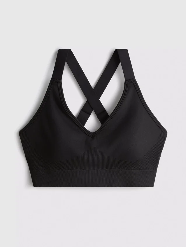 Sømløs aktiv crop-top med kryssrygg