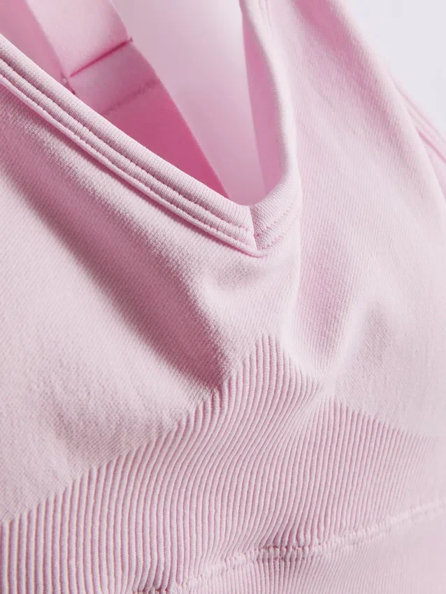 Sømløs aktiv crop-top med kryssrygg