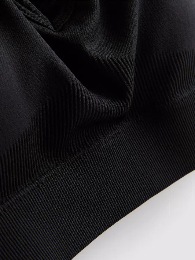 Sømløs aktiv crop-top med kryssrygg