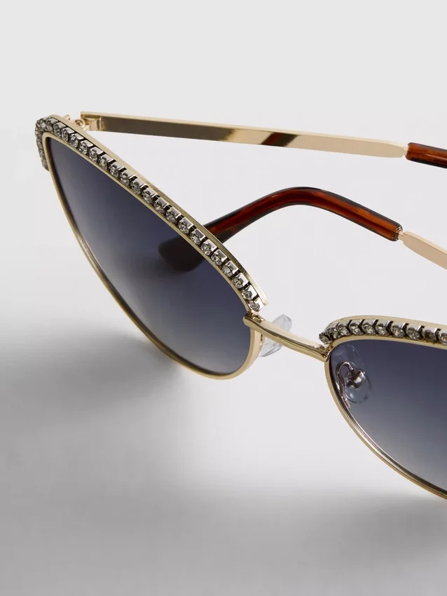Solbriller i «cat eye»-stil med rhinestones