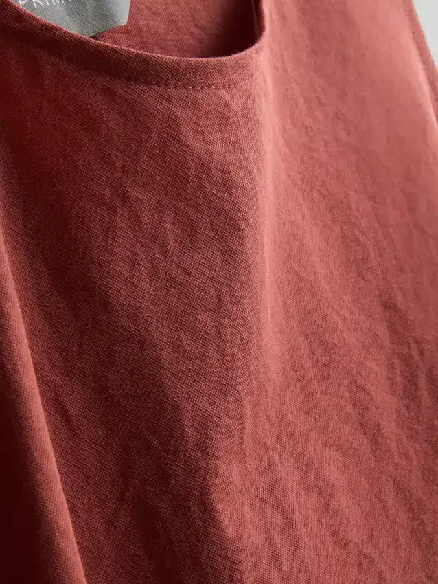 Strikket tank-top med bånd i sidene