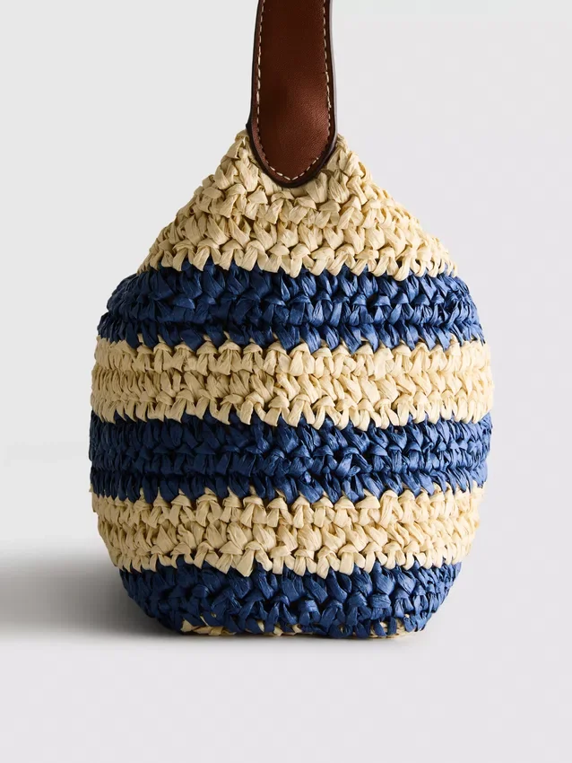 Stripet raffia-skulderveske