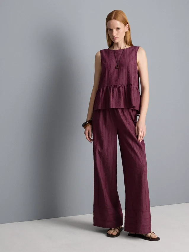 Stripet topp med peplum-kant
