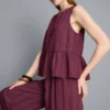 Stripet topp med peplum-kant