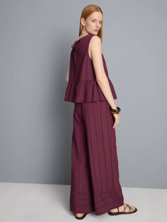 Stripet topp med peplum-kant