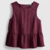 Stripet topp med peplum-kant