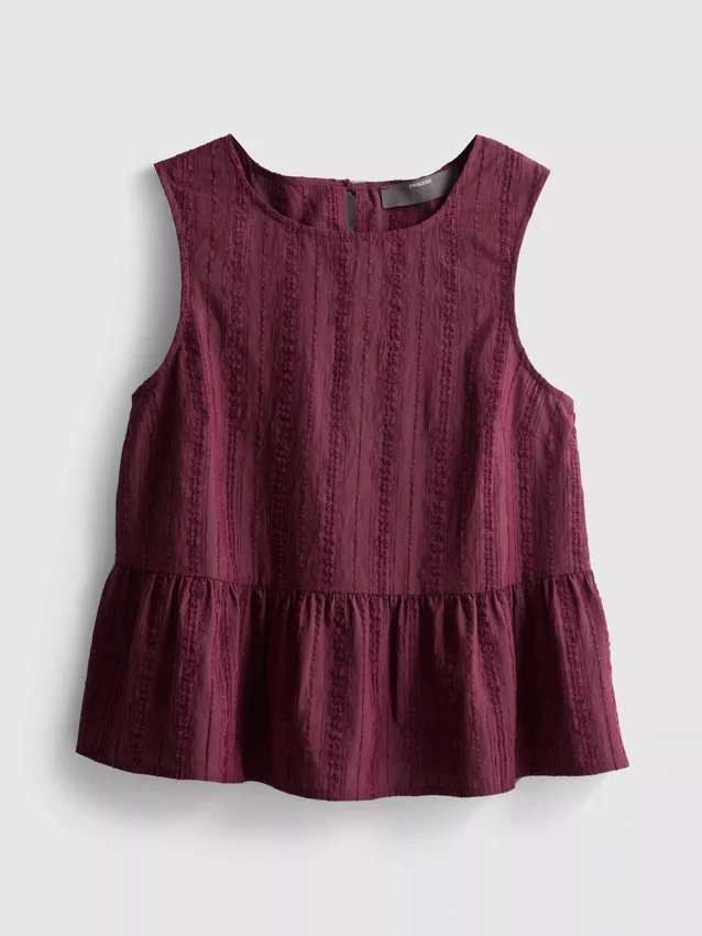 Stripet topp med peplum-kant