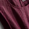 Stripet topp med peplum-kant