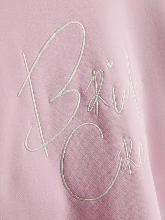 Sweatshirt med slagord for brudeparet