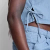 Tanktop i bomullsdenim med bånd i sidene