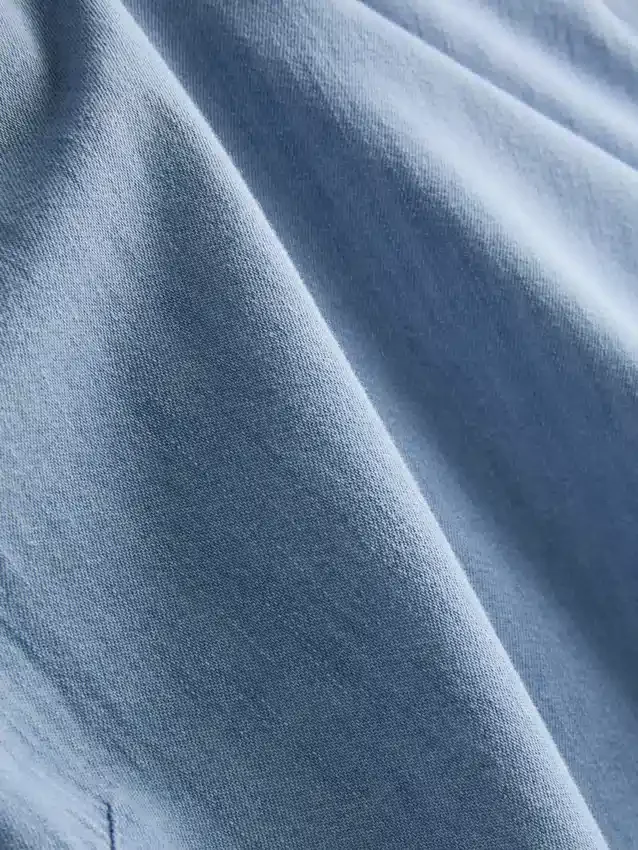 Tanktop i bomullsdenim med bånd i sidene