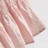 Tanktop med rynket peplum-kant