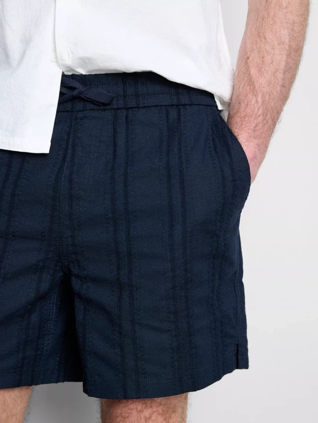 Teksturerte shorts med snøring