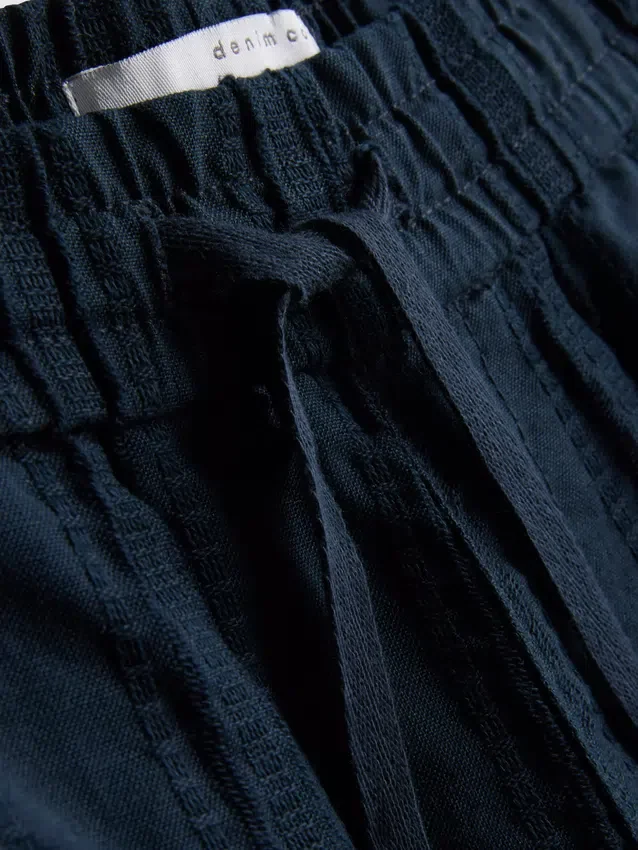 Teksturerte shorts med snøring