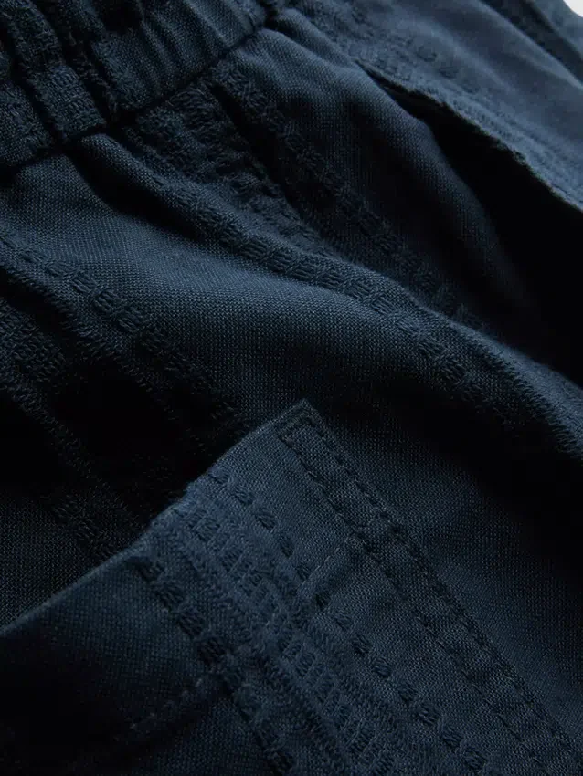 Teksturerte shorts med snøring