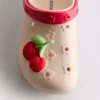 Tøfler med fruktmerke