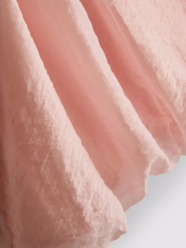 The Edit drapert halterneck-bluse med luftig snitt