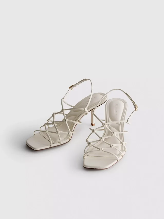 The Edit-sandaler med flettet stilettohæl
