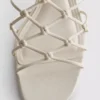 The Edit-sandaler med flettet stilettohæl