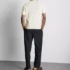 The Edit strikket poloskjorte