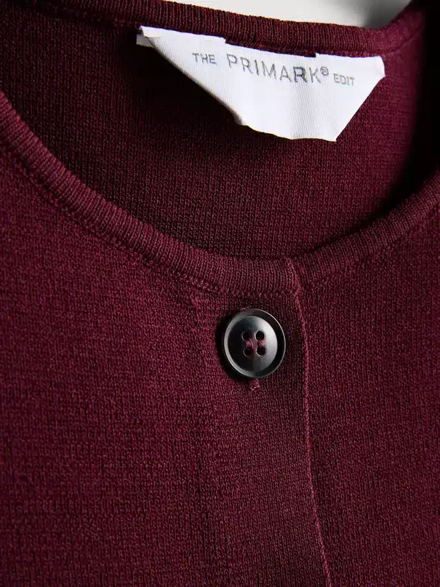 The Edit strikket topp med knapper