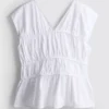 The Edit-top i poplin med rynket V-hals