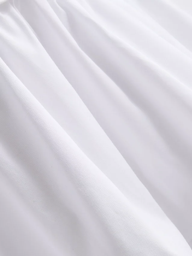 The Edit-top i poplin med rynket V-hals