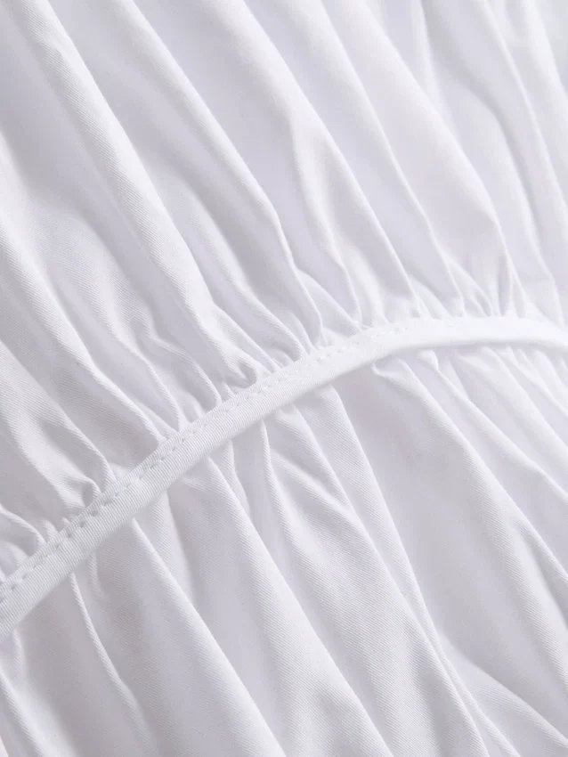 The Edit-top i poplin med rynket V-hals