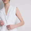 The Edit-vest i lin med bånddetaljer