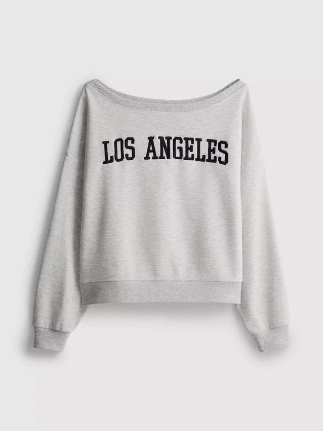 The Primark Scene | Sweatshirt med slagord og bare skuldre