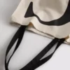 Tote-veske med initialer
