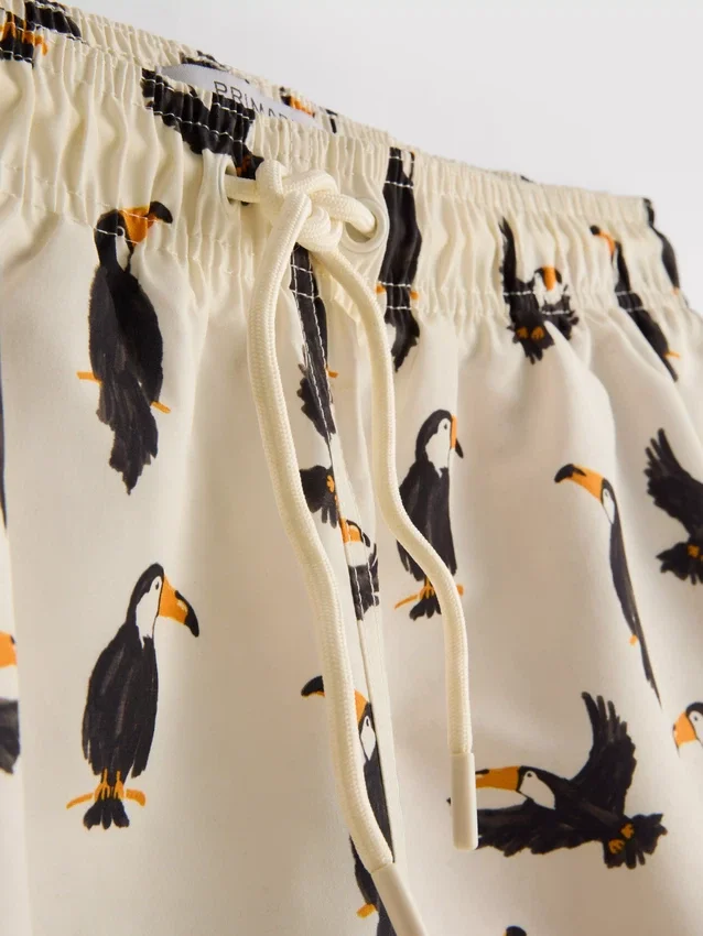 Toucan-shorts med snøring i livet