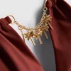 Triangel-bikinitopp med kjede-detaljer