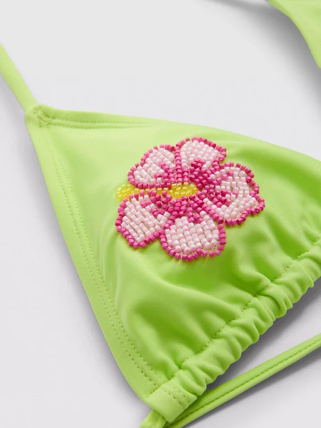 Triangel-bikinitopp med perleblomst