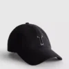 Tuftet cap med initialer