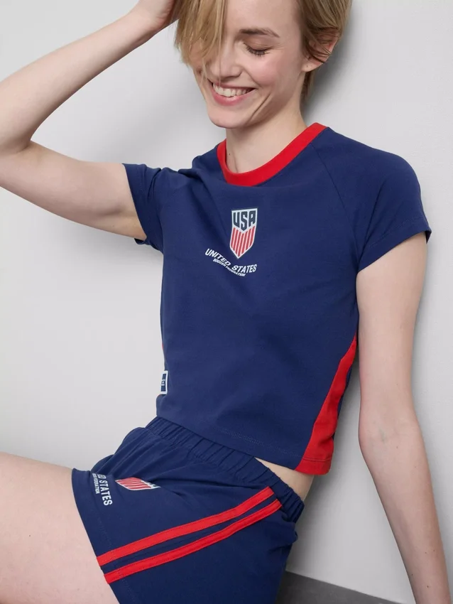 USA fotball-pysjamaser med korte shorts