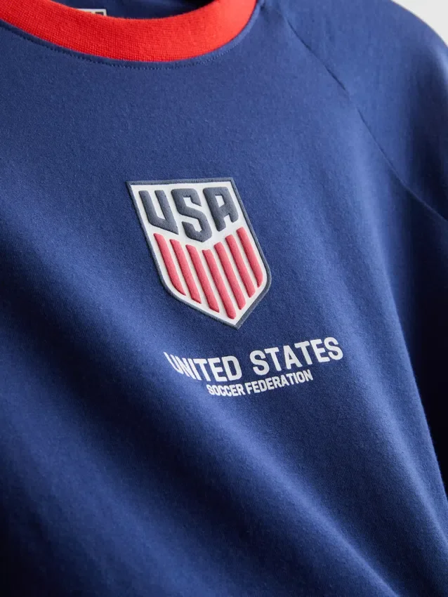 USA fotball-pysjamaser med korte shorts