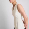V-halset, peplum-inspirert, ermeløs topp