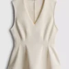 V-halset, peplum-inspirert, ermeløs topp