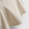 V-halset, peplum-inspirert, ermeløs topp