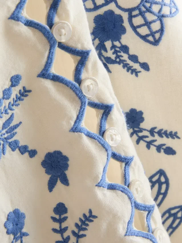 Vest i bomull med blomsterbroderi